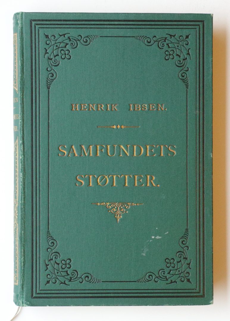 Green hardcover book with gold lettering and intricate black border patterns, reading 'HENRIK IBSEN' and 'SAMFUNDETS STØTTER' on the cover.